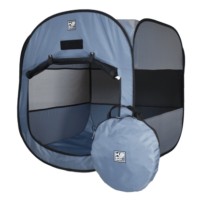 A gray K9 Sport Sack pop-up dog tent.