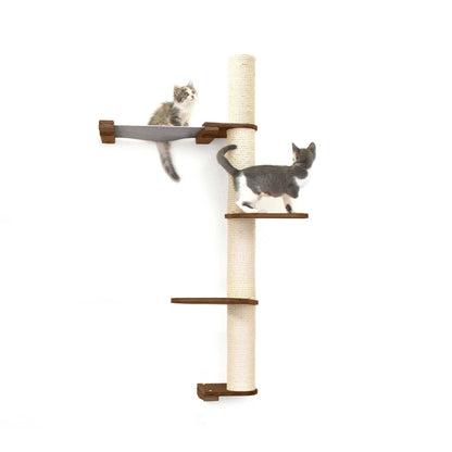 Vertical cat perch in natural bamboo with multiple tiers, natural canvas hammock, and sisal-covered scratching poles, ideal.