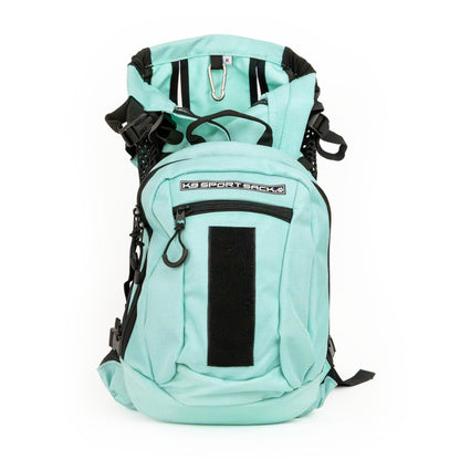 A teal-colored K9 Sport Sack backpack.
