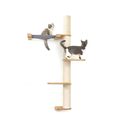 Tall cat perch with natural bamboo vertical scratching pole and summit hammock in neutral canvas, part of cat tree wall.