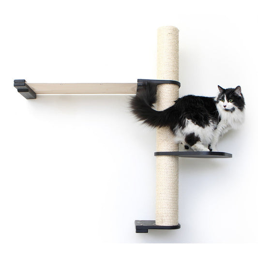 Vertical cat perch with natural bamboo scratching pole and black summit hammock, mounted on wall for cat tree wall design.
