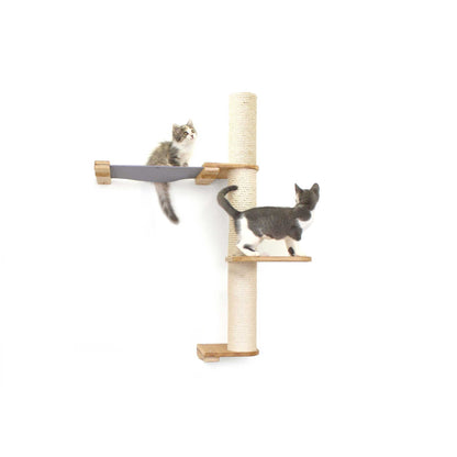 Vertical cat perch with bamboo scratching pole and two-tier natural canvas hammock, stylish cat tree wall accessory.